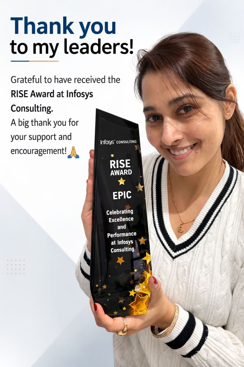 Reshma holding her RISE Award at Infosys Consulting
